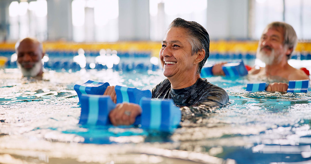 People exercising in a pool to help with arthritis